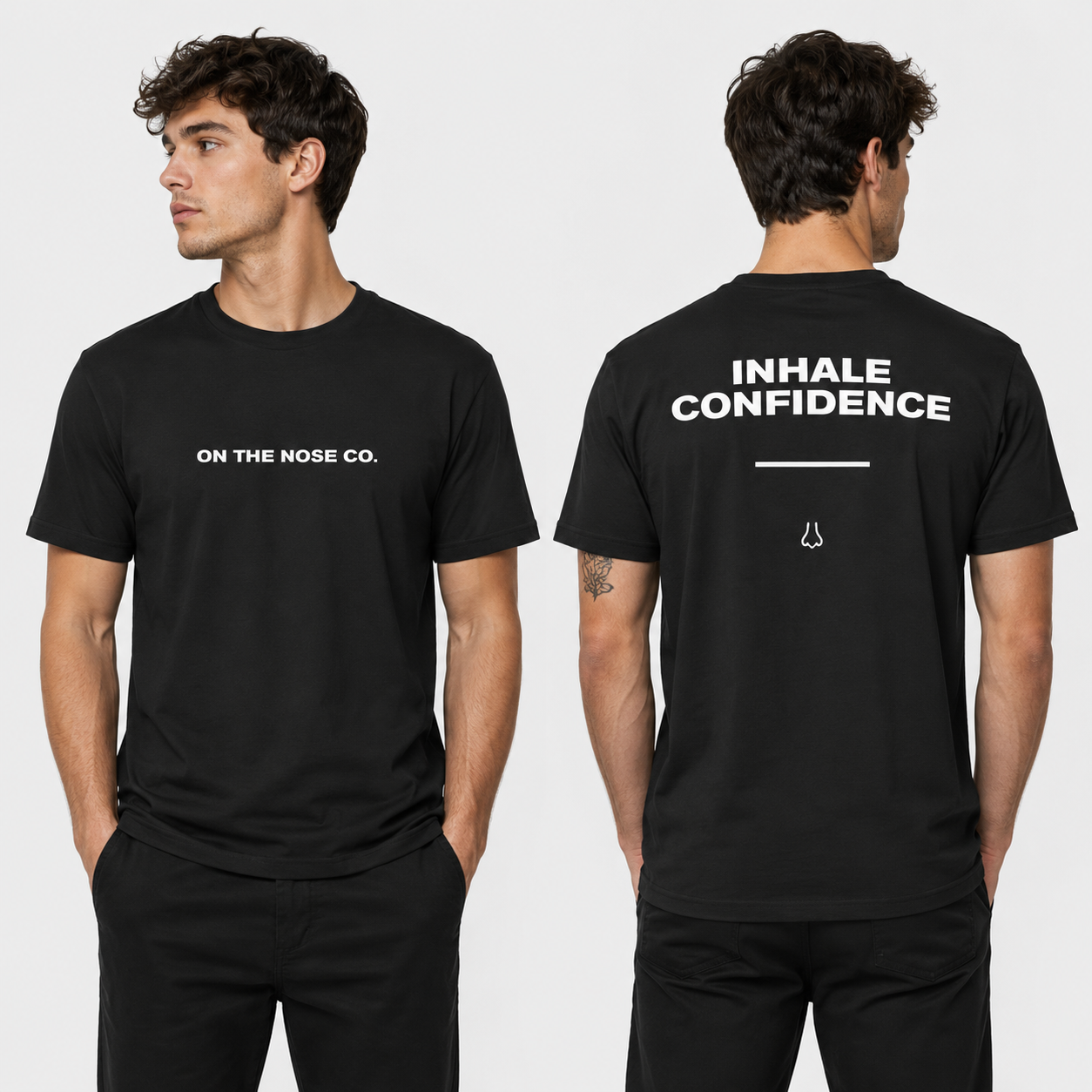 Black t-shirt with text on front and back worn by a person, on a white background